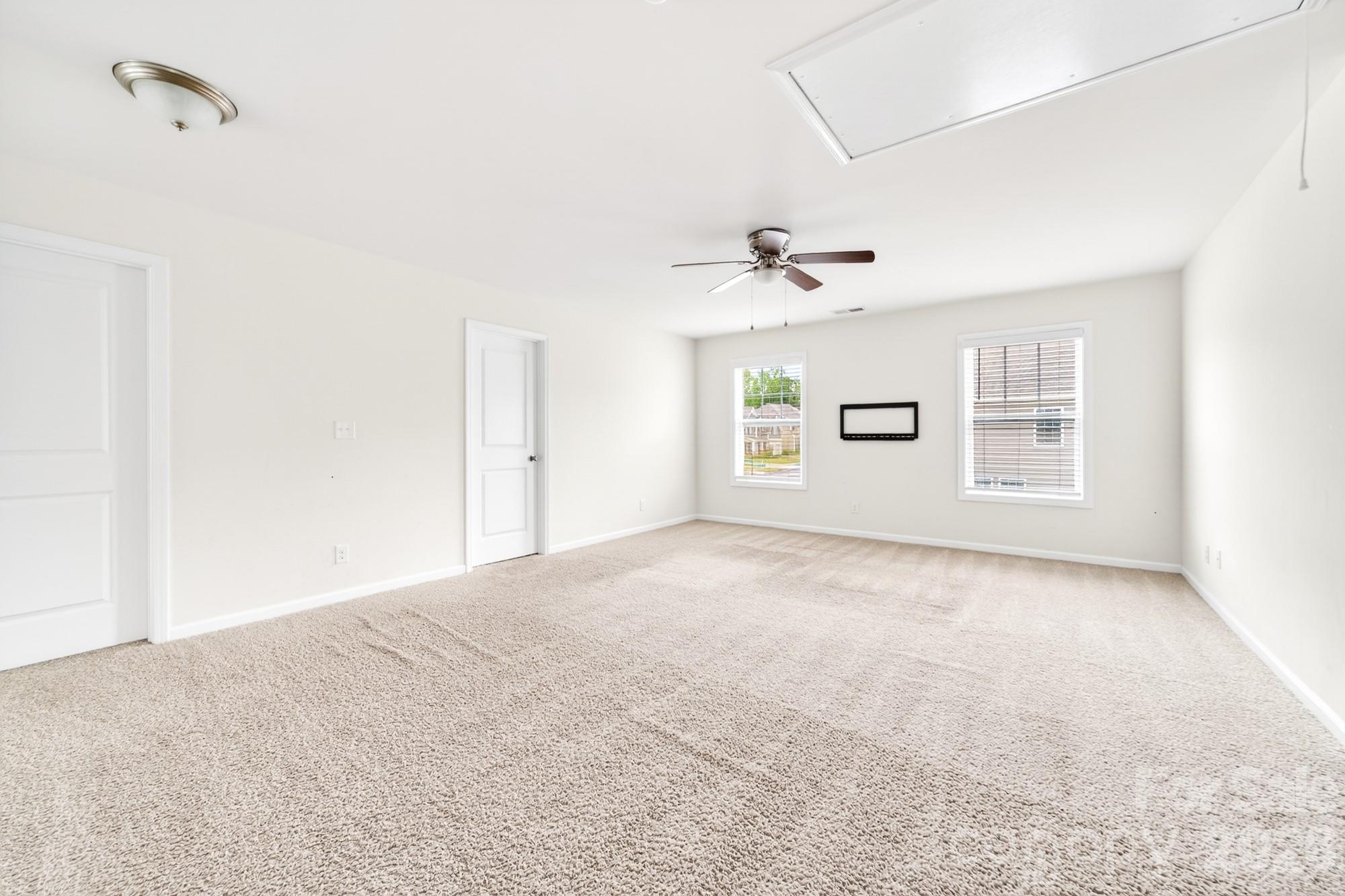 5972 Redwood Pine Road Concord, NC 28027 - Photo 21 of 37 a view of an empty room with a window