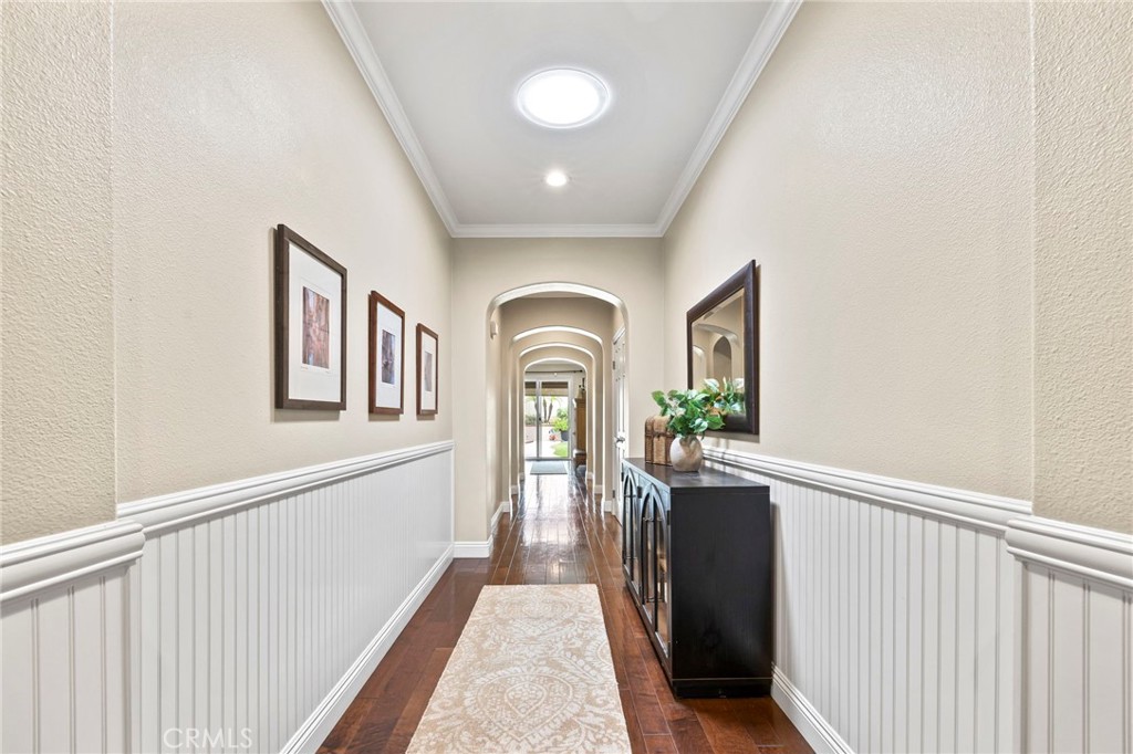 1705 Arthur Loop West Upland, CA 91784 - Photo 5 of 30 Beautiful entry corridor with Wainscotting, sky lights and wood floors