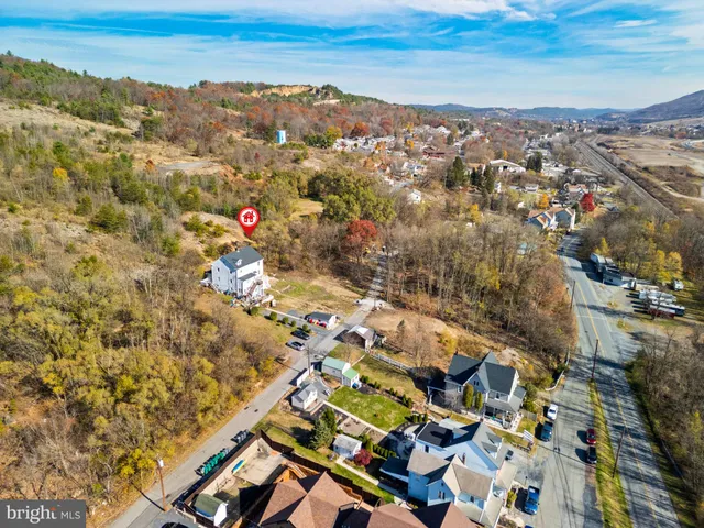 an aerial view of residential building with parking space