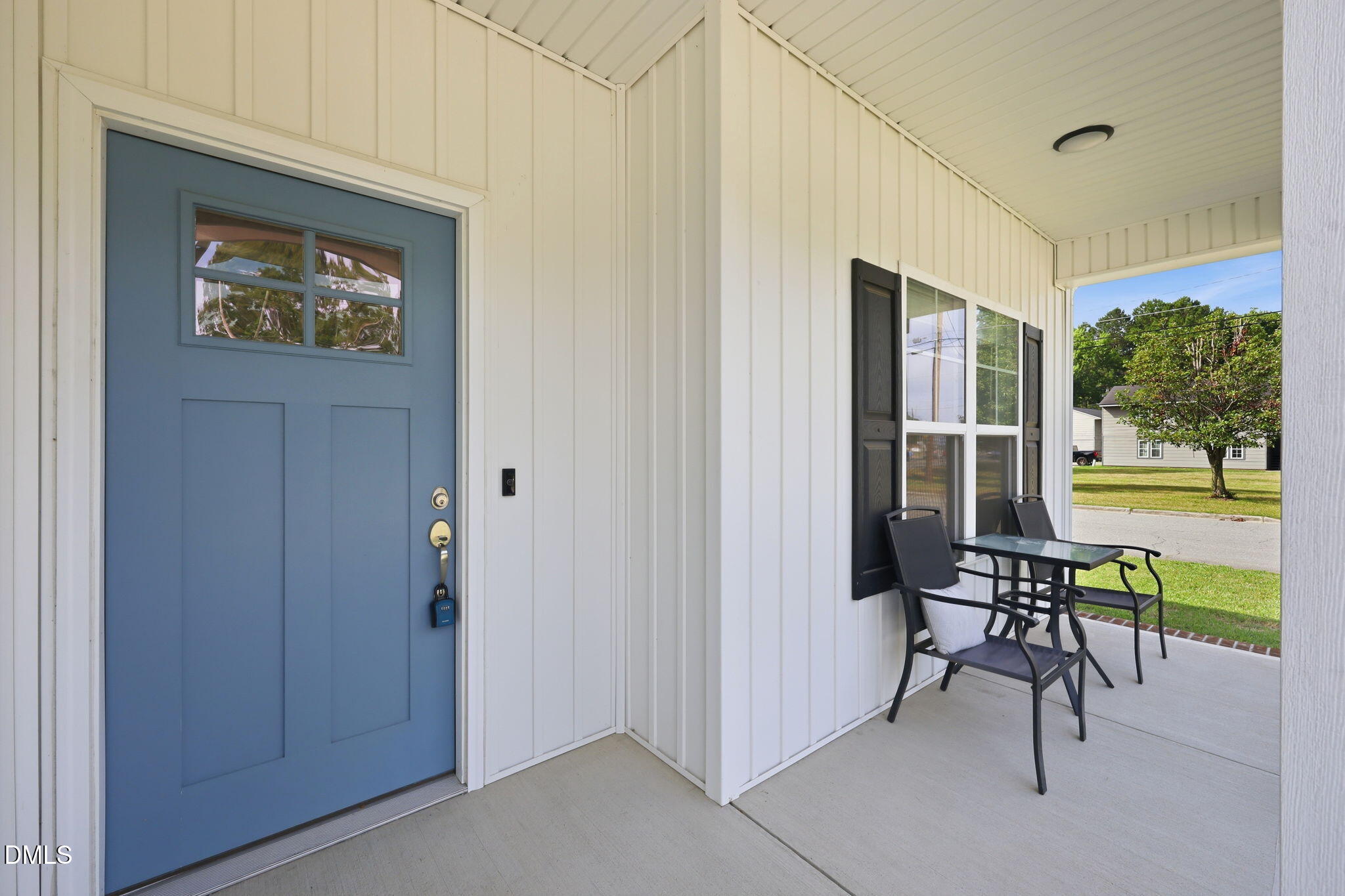 709 South Pollock Street Selma, NC 27576 - Photo 5 of 30 a view of a hallway with a dining table and chairs