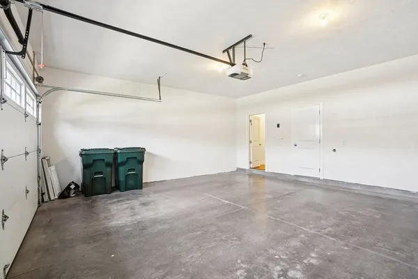 an empty room with wooden floor
