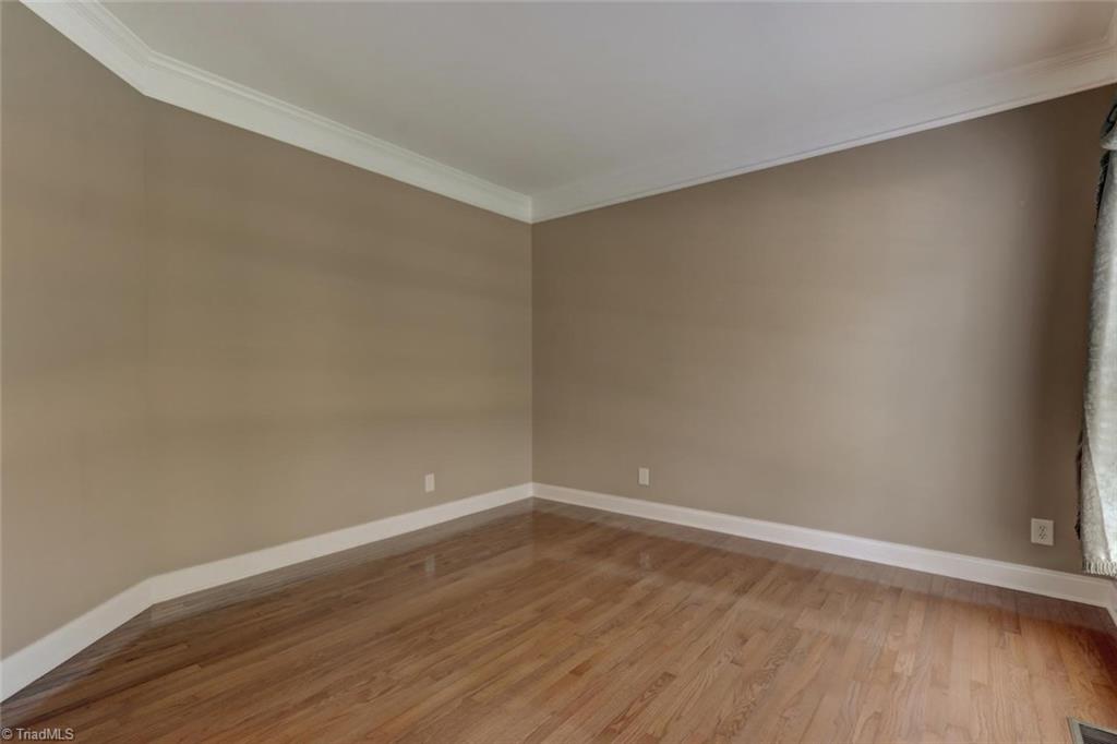 8302 Chartwell Drive Oak Ridge, NC 27310 - Photo 11 of 30 Formal living room second view.