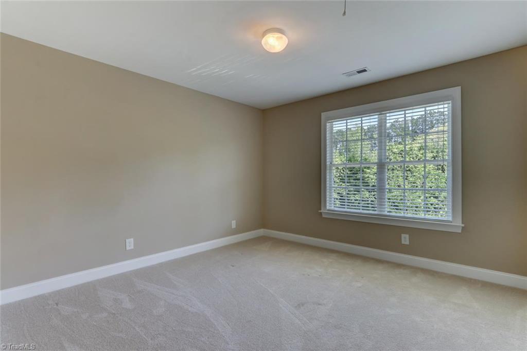 8302 Chartwell Drive Oak Ridge, NC 27310 - Photo 19 of 30 Second bedroom
