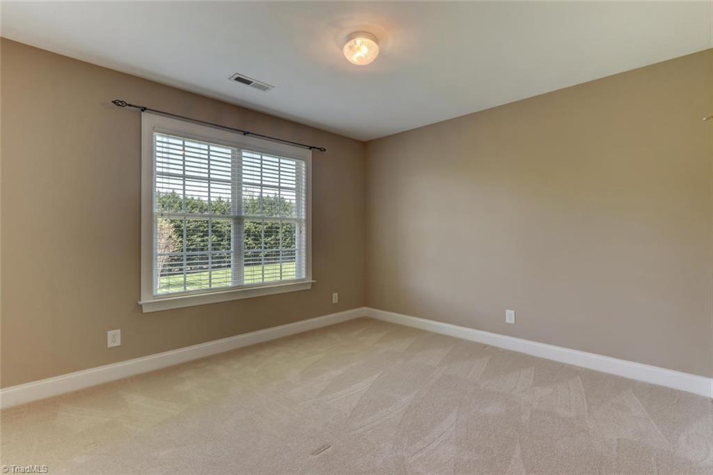 8302 Chartwell Drive Oak Ridge, NC 27310 - Photo 21 of 30 Third Bedroom