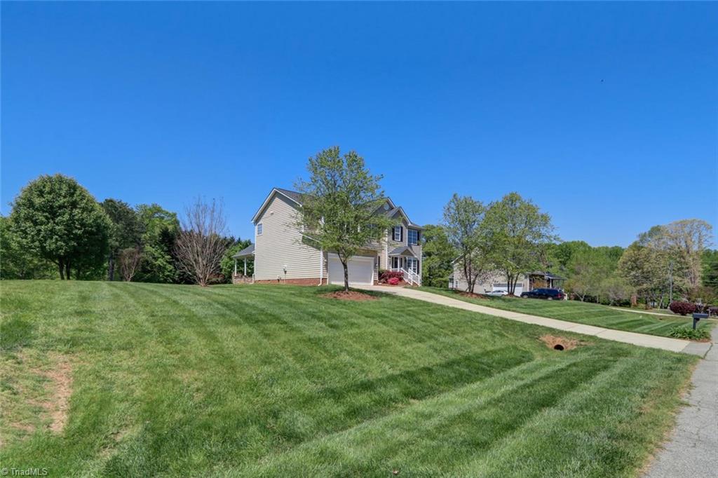 8302 Chartwell Drive Oak Ridge, NC 27310 - Photo 28 of 30 Curbside view