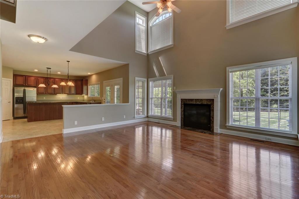 8302 Chartwell Drive Oak Ridge, NC 27310 - Photo 8 of 30 Second view of the Great Room. You see the gorgeous wood floors that are in amazing condition and go throughout the entire main floor.