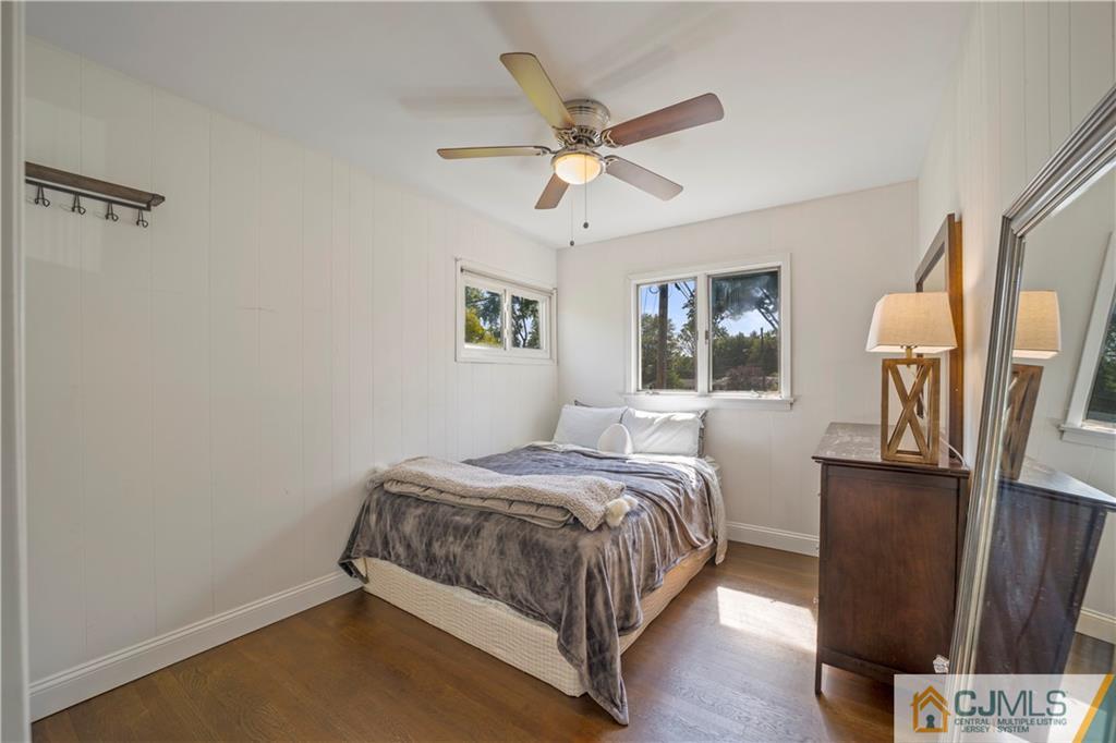 25 Princeton Road Old Bridge, NJ 08859 - Photo 15 of 26 a bedroom with a bed next to a window