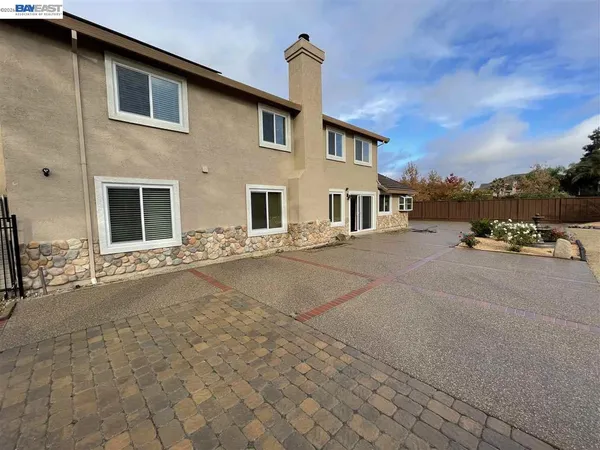 a view of a house with a patio