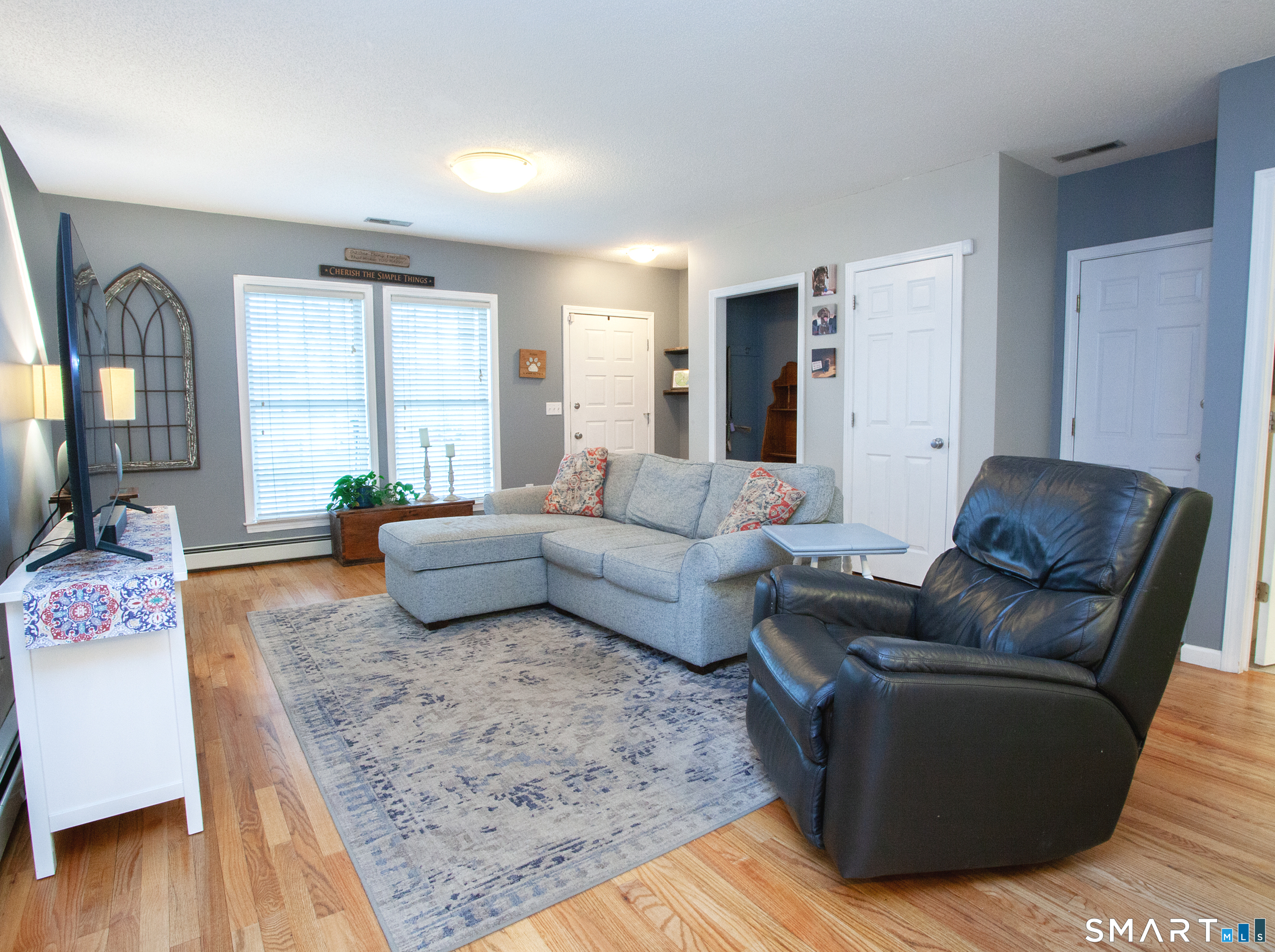 15 Rockledge Lane Canton, CT 06019 - Photo 11 of 30 a living room with furniture and wooden floor