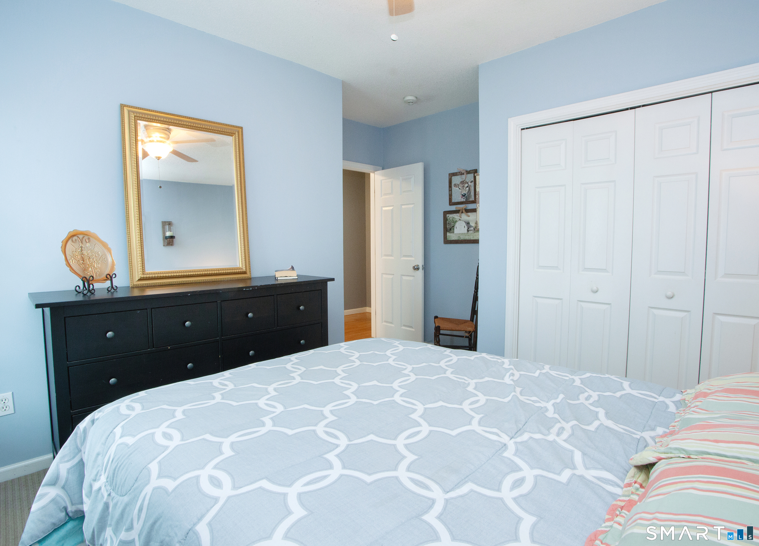 15 Rockledge Lane Canton, CT 06019 - Photo 18 of 30 a bedroom with a bed and a dresser