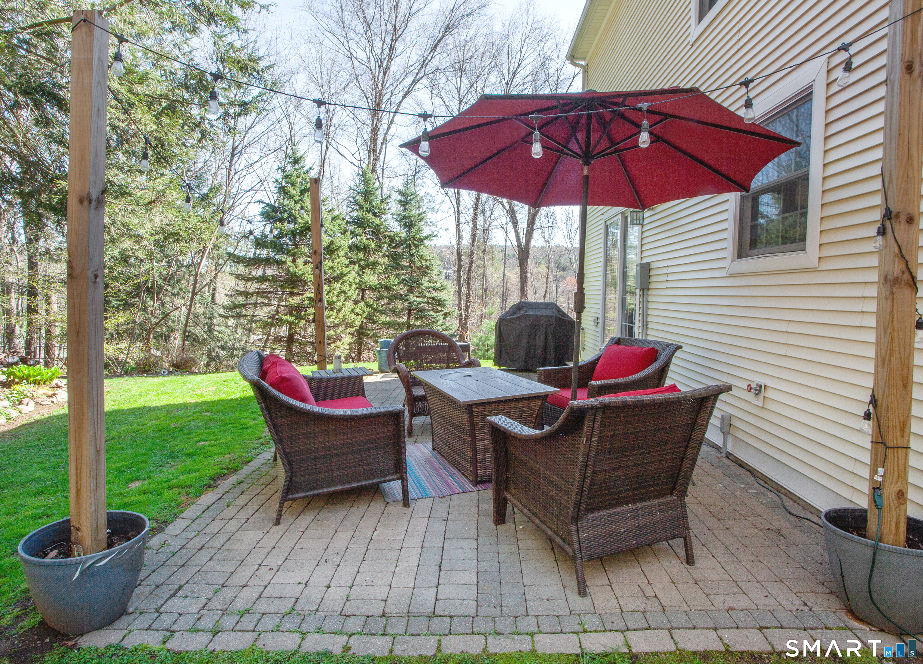 15 Rockledge Lane Canton, CT 06019 - Photo 25 of 30 a view of a sitting area with furniture and garden