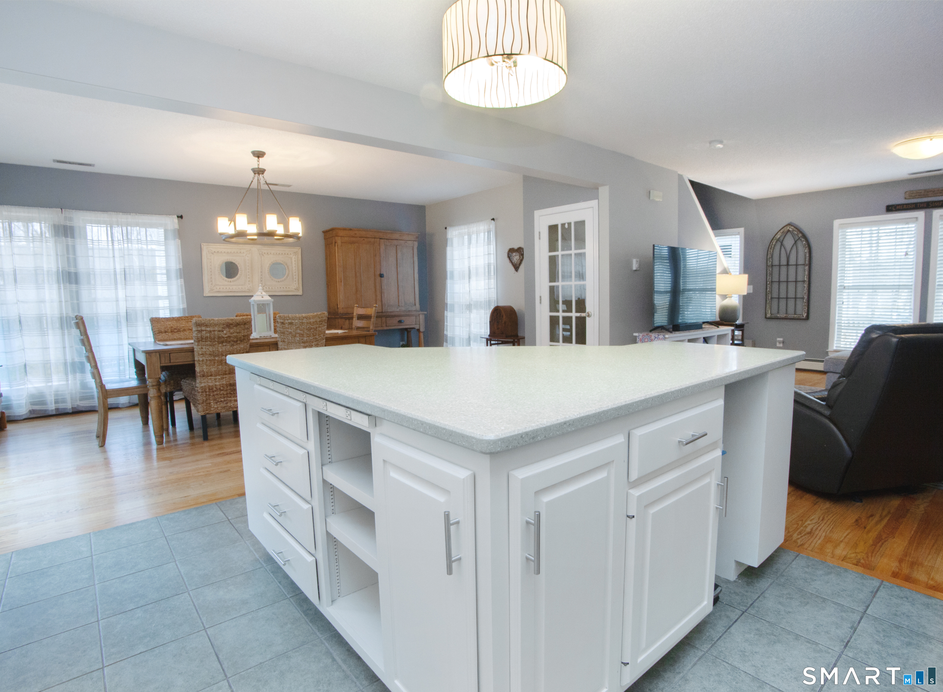 15 Rockledge Lane Canton, CT 06019 - Photo 7 of 30 a large white kitchen with a window and dining table