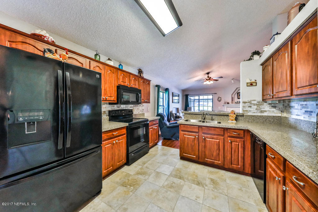 11889 Swooping Willow Road Jacksonville, FL 32223 - Photo 15 of 31 573A0014