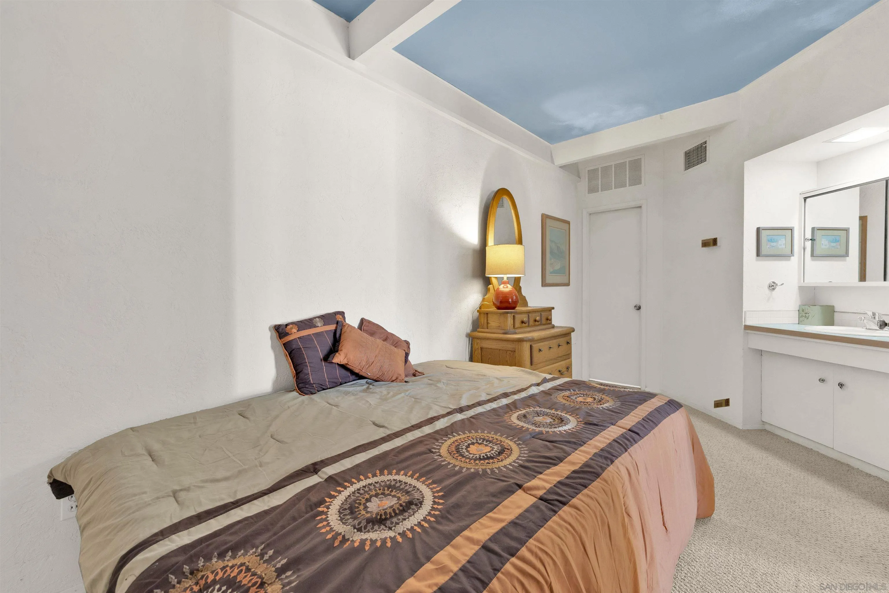 119 Montezuma Road Borrego Springs, CA 92004 - Photo 19 of 47 a bedroom with a bed and a dresser