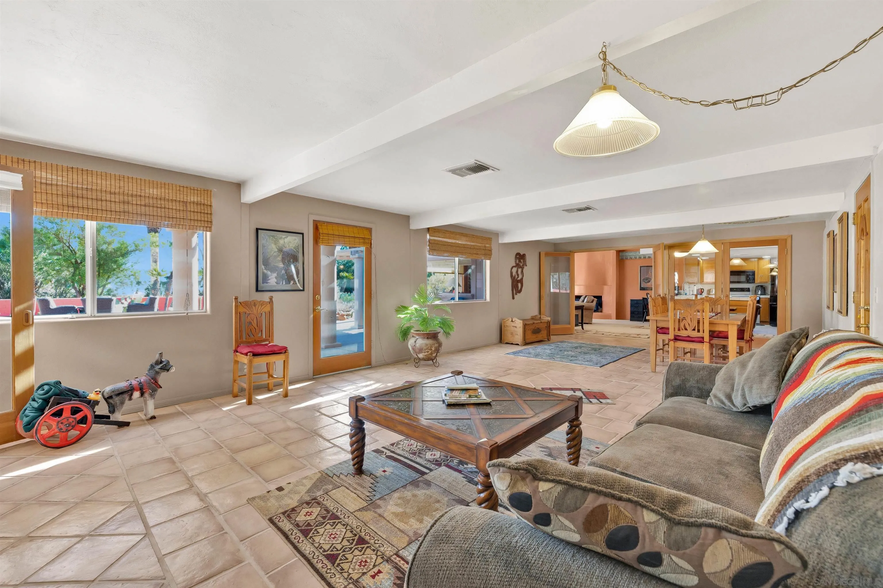119 Montezuma Road Borrego Springs, CA 92004 - Photo 21 of 47 a living room with furniture and a large window