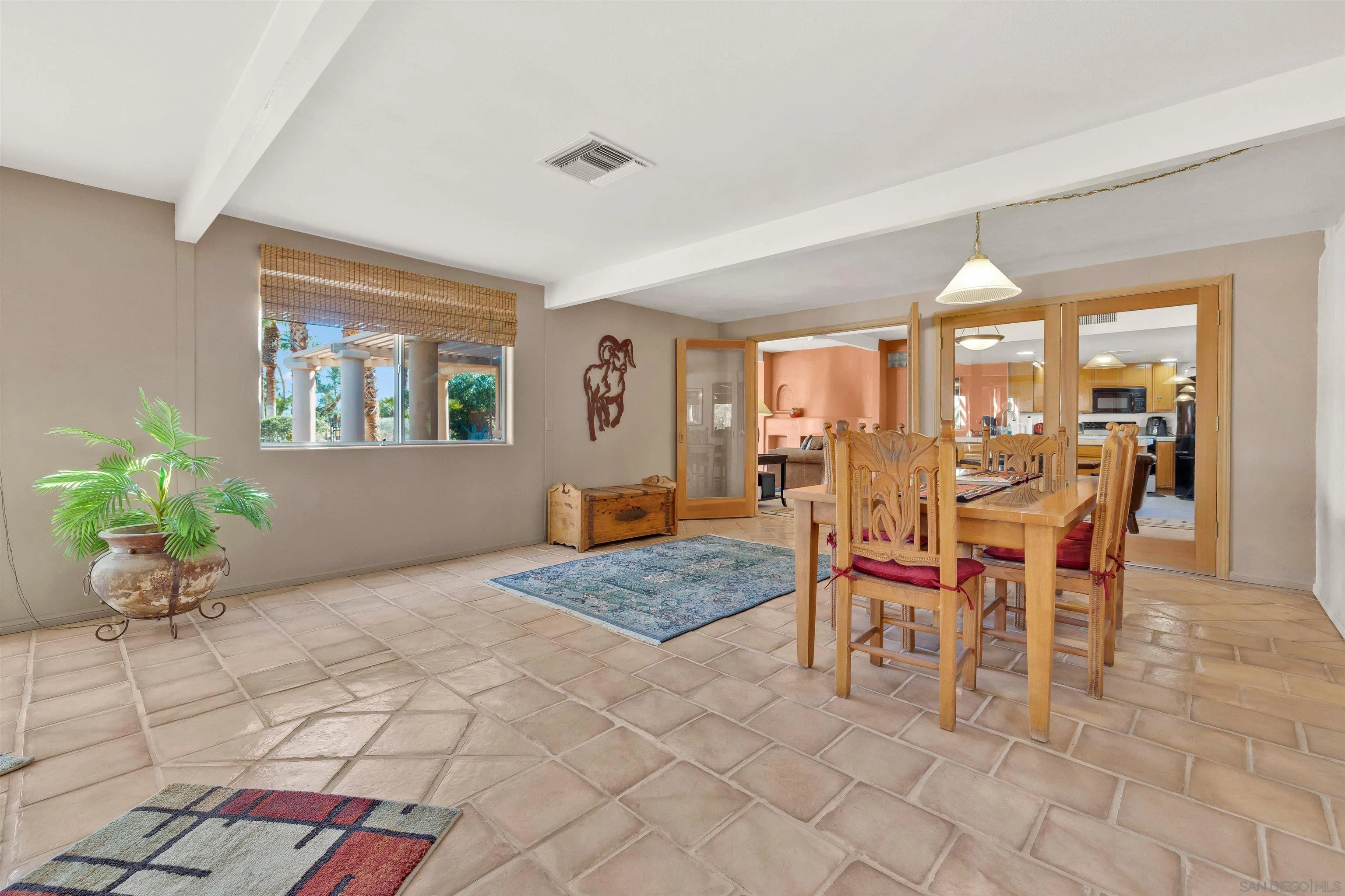 119 Montezuma Road Borrego Springs, CA 92004 - Photo 22 of 47 a dining room with furniture and window