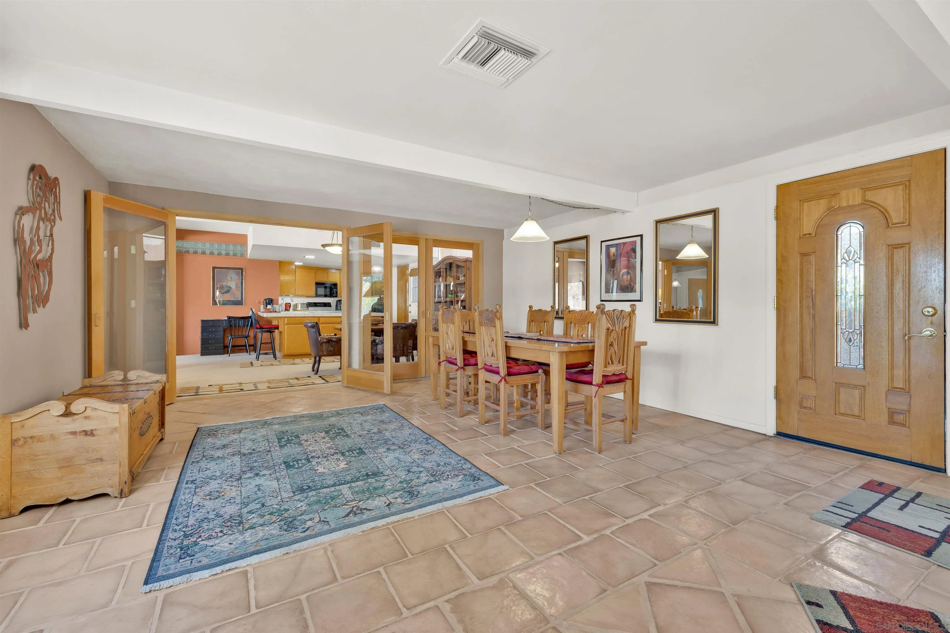119 Montezuma Road Borrego Springs, CA 92004 - Photo 23 of 47 a living room with furniture and a dining table