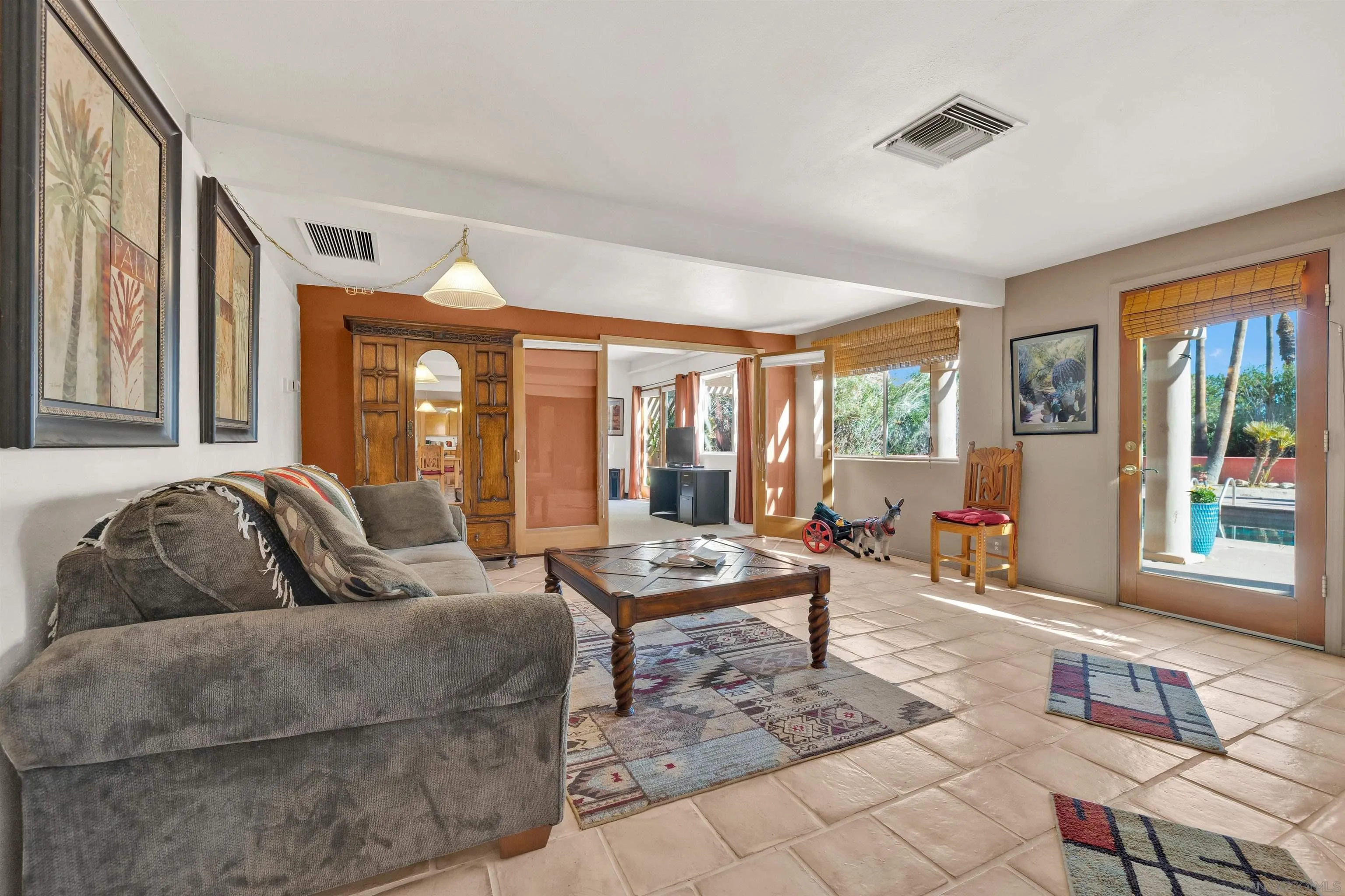 119 Montezuma Road Borrego Springs, CA 92004 - Photo 24 of 47 a living room with furniture and large windows