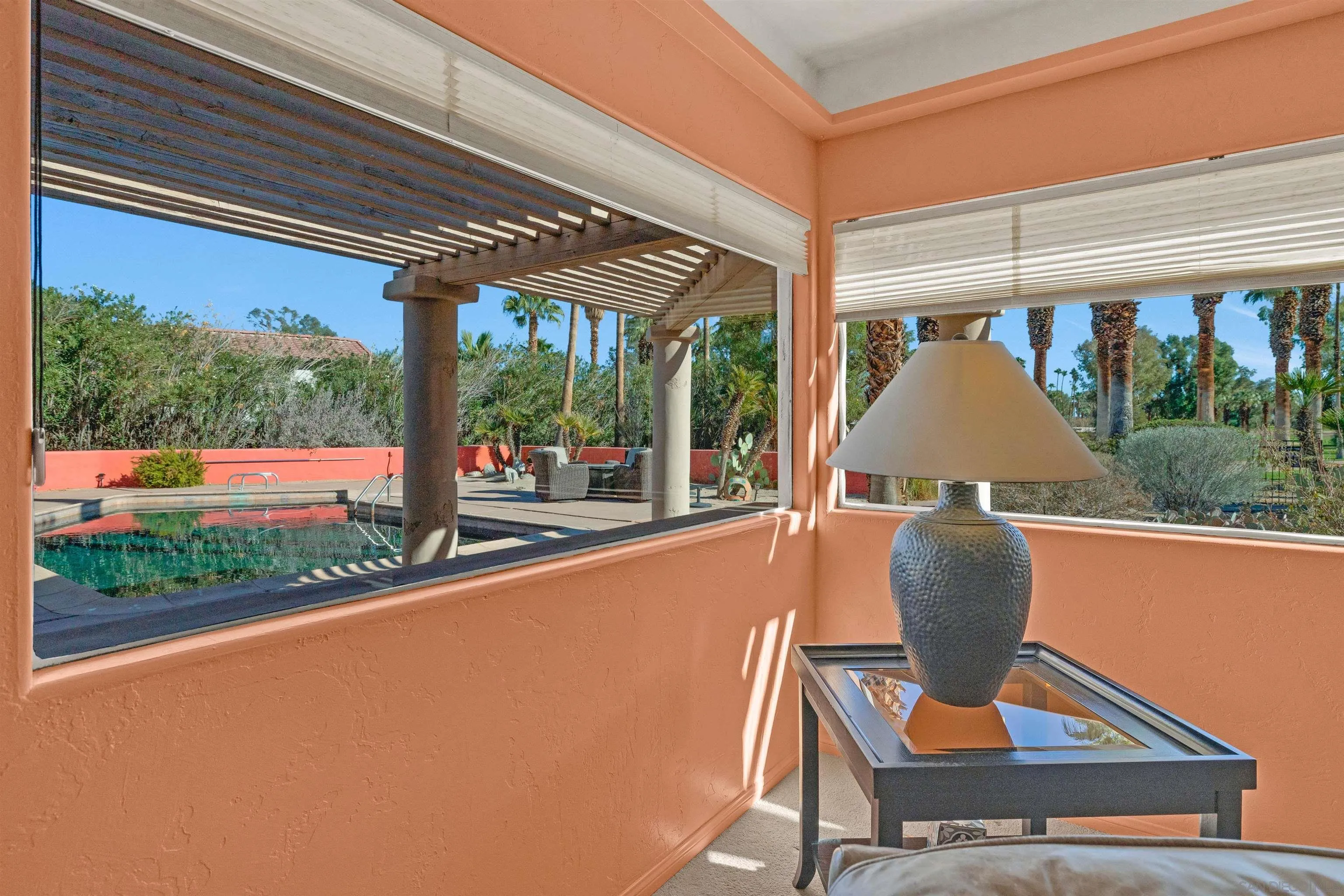119 Montezuma Road Borrego Springs, CA 92004 - Photo 36 of 47 a view of a patio with a table chairs and a table