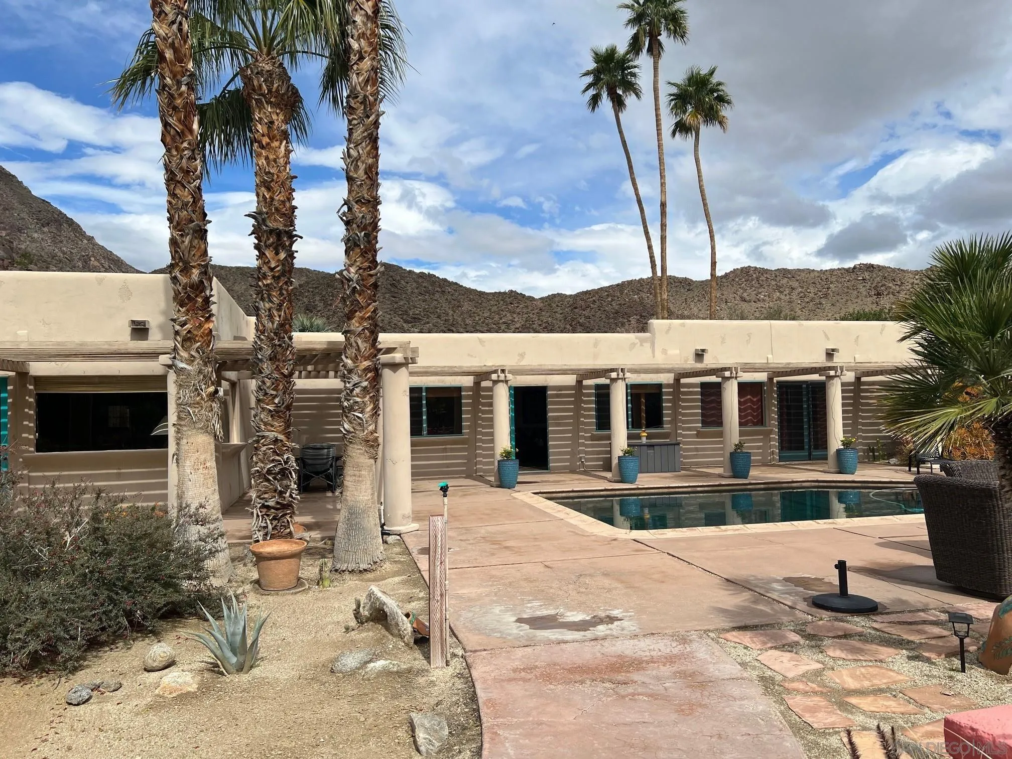 119 Montezuma Road Borrego Springs, CA 92004 - Photo 6 of 47 a view of a house with a backyard