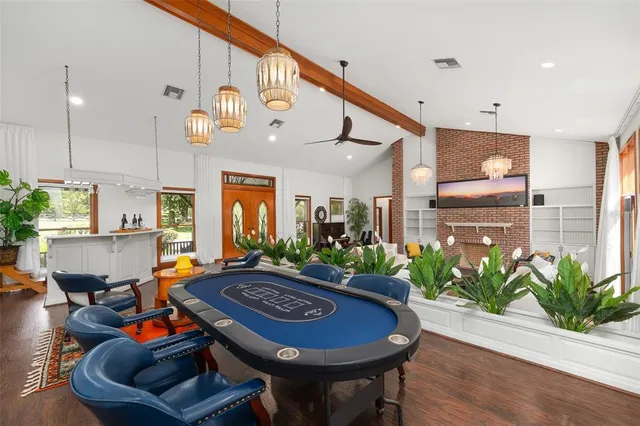 a kitchen with a sink a stove and cabinets