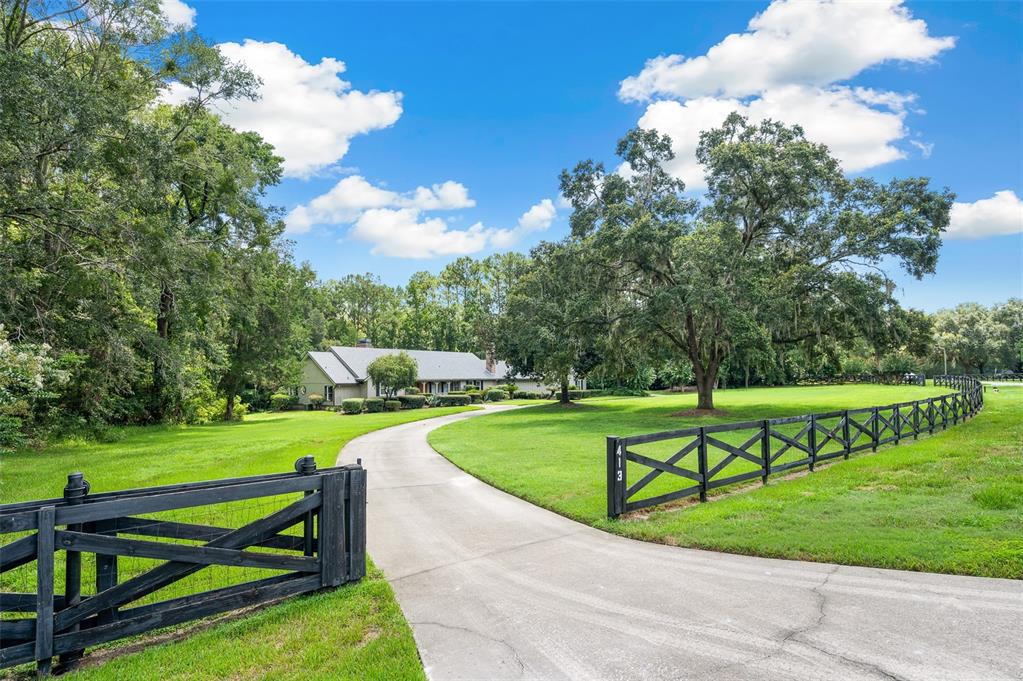 413 Southwest 97 Terrace Gainesville, FL 32607 - Photo 2 of 67 a view of a park with large trees