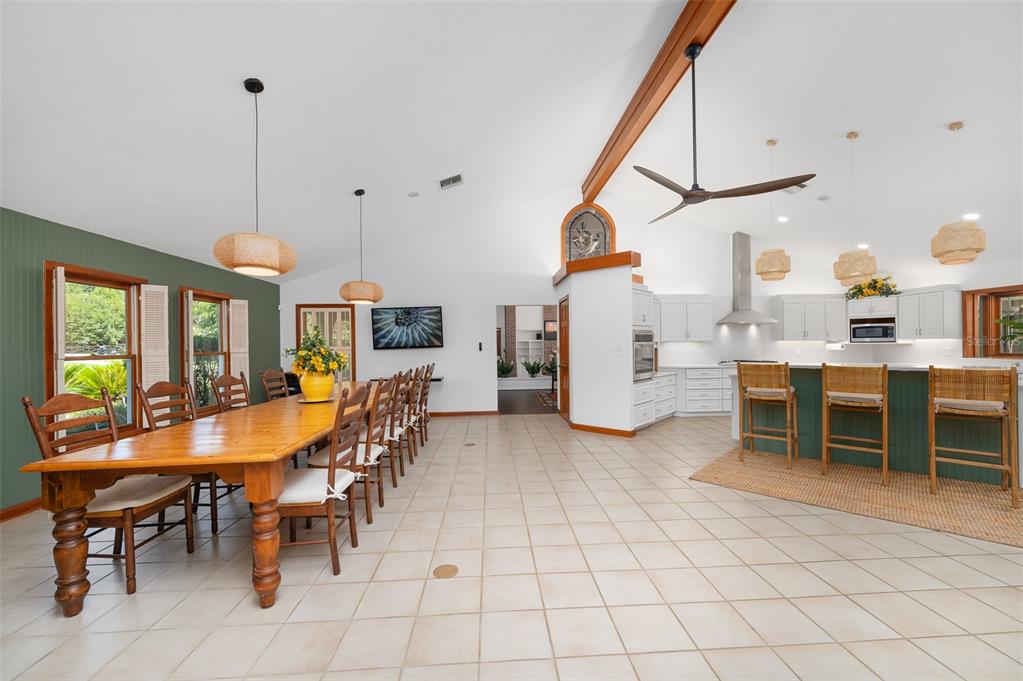 413 Southwest 97 Terrace Gainesville, FL 32607 - Photo 21 of 67 a view of a dining room with furniture window and wooden floor