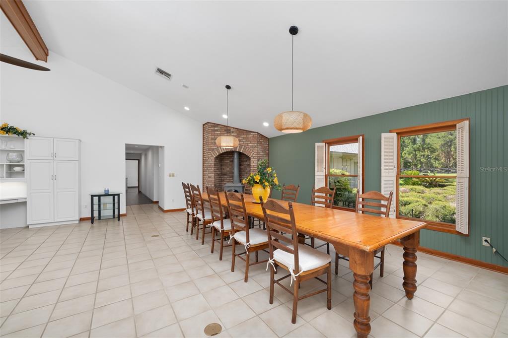 413 Southwest 97 Terrace Gainesville, FL 32607 - Photo 23 of 67 a view of a dining room with furniture window and outside view