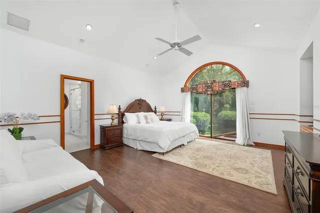 a white bath tub sitting next to a window