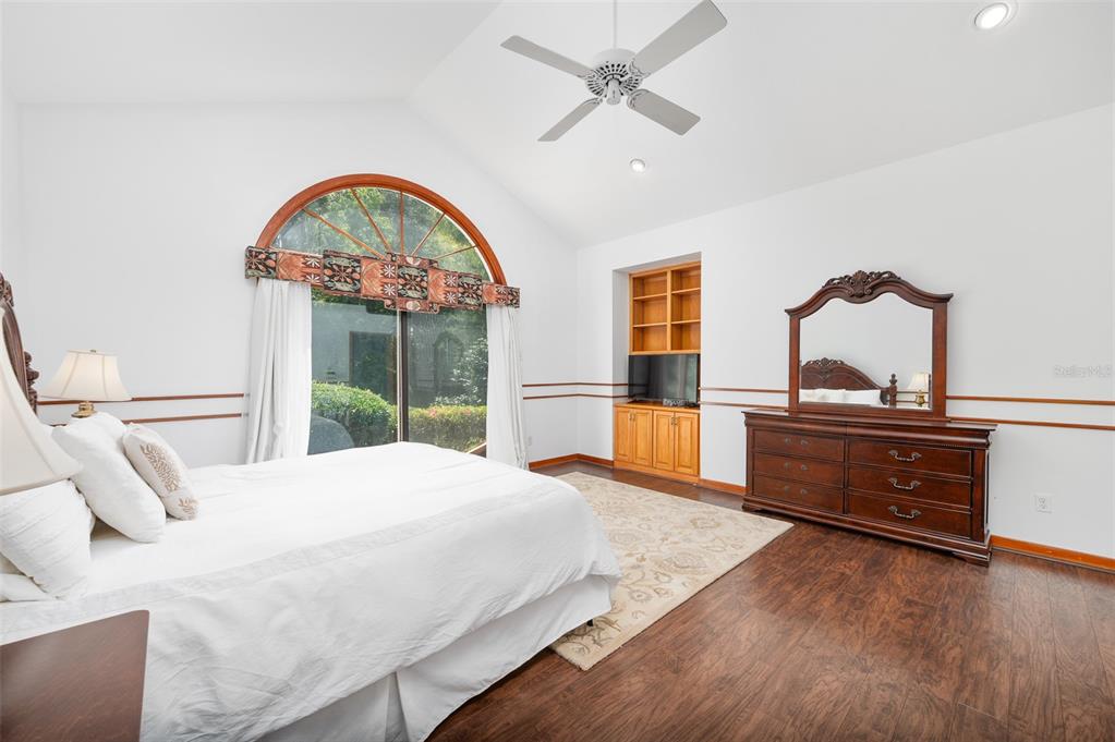 413 Southwest 97 Terrace Gainesville, FL 32607 - Photo 25 of 67 a bedroom with a bed and a dresser