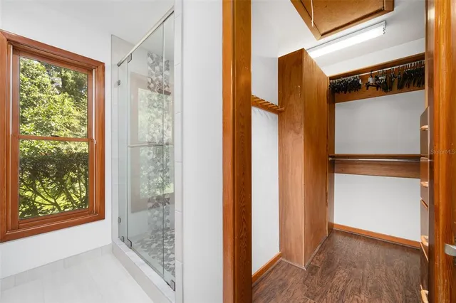 a work room with furniture and wooden floor