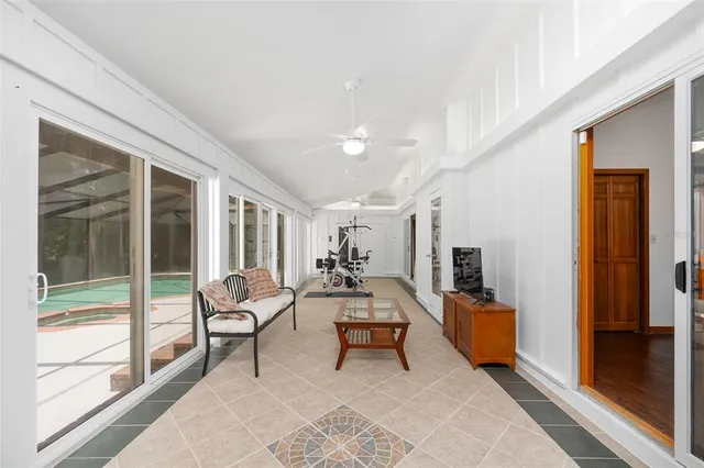 a front view of a house with yard and green space