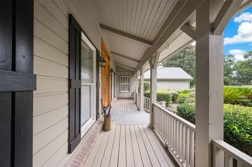 413 Southwest 97 Terrace Gainesville, FL 32607 - Photo 5 of 67 a view of a house with a porch