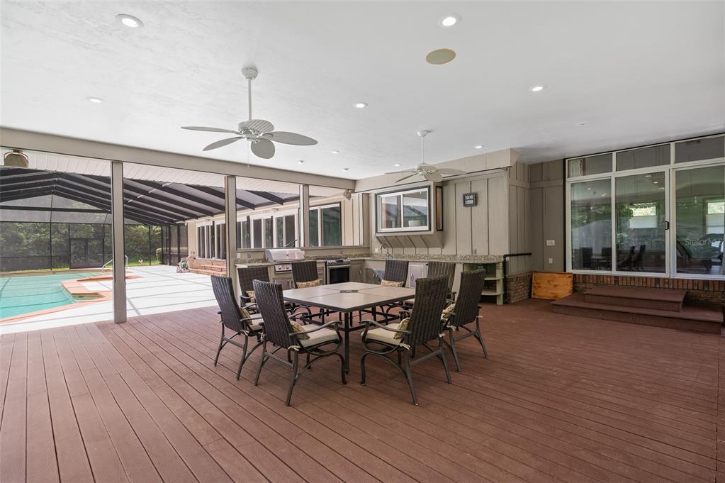 413 Southwest 97 Terrace Gainesville, FL 32607 - Photo 59 of 67 a dining room with furniture and wooden floor