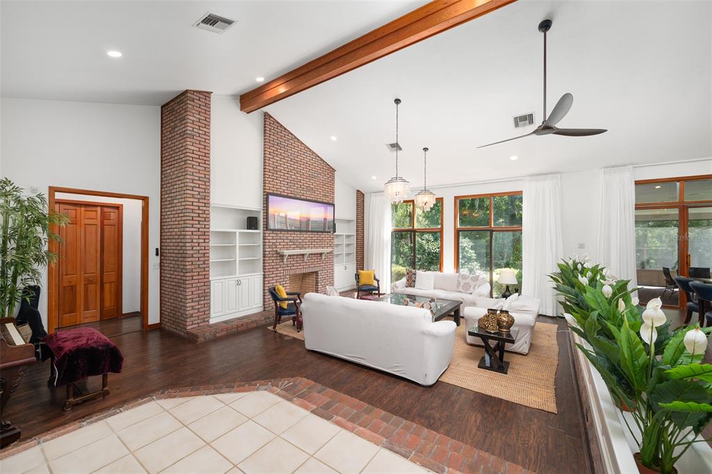 413 Southwest 97 Terrace Gainesville, FL 32607 - Photo 7 of 67 a living room with furniture and a large window
