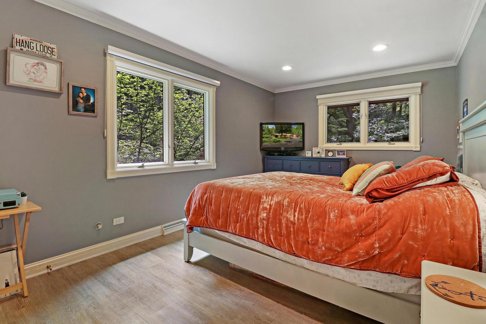 112 River Drive Trout Valley, IL 60013 - Photo 15 of 28 a bed sitting in a bedroom next to a window