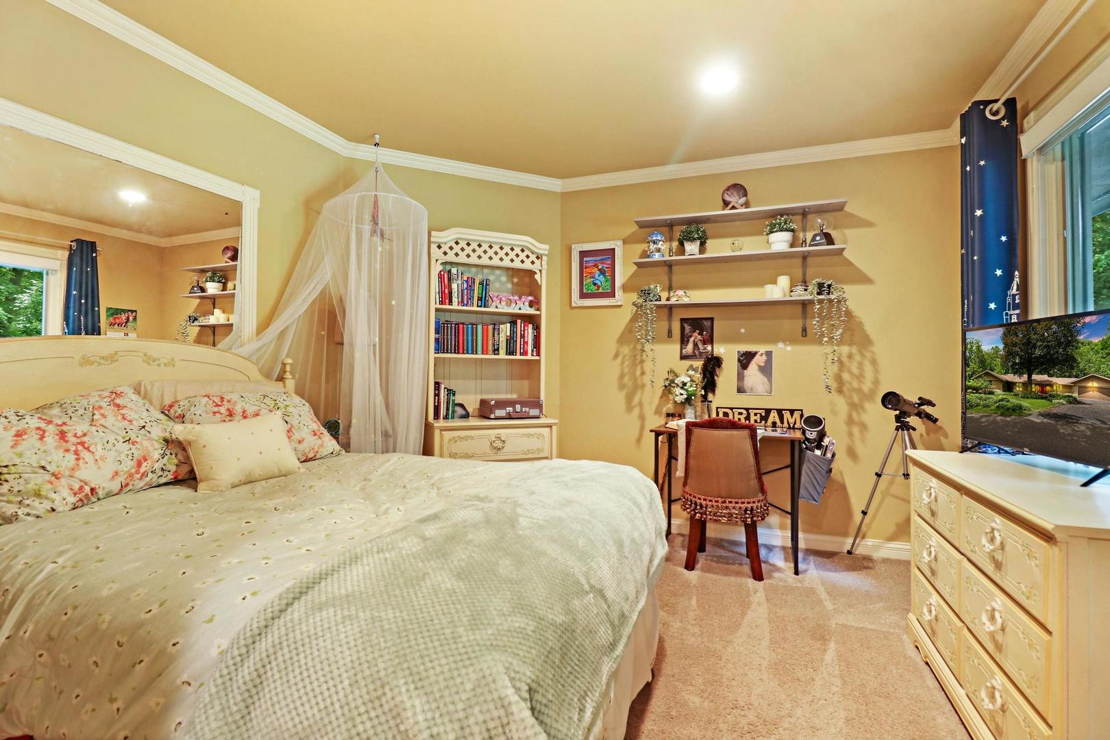 112 River Drive Trout Valley, IL 60013 - Photo 17 of 28 a bedroom with a bed lamps and chairs