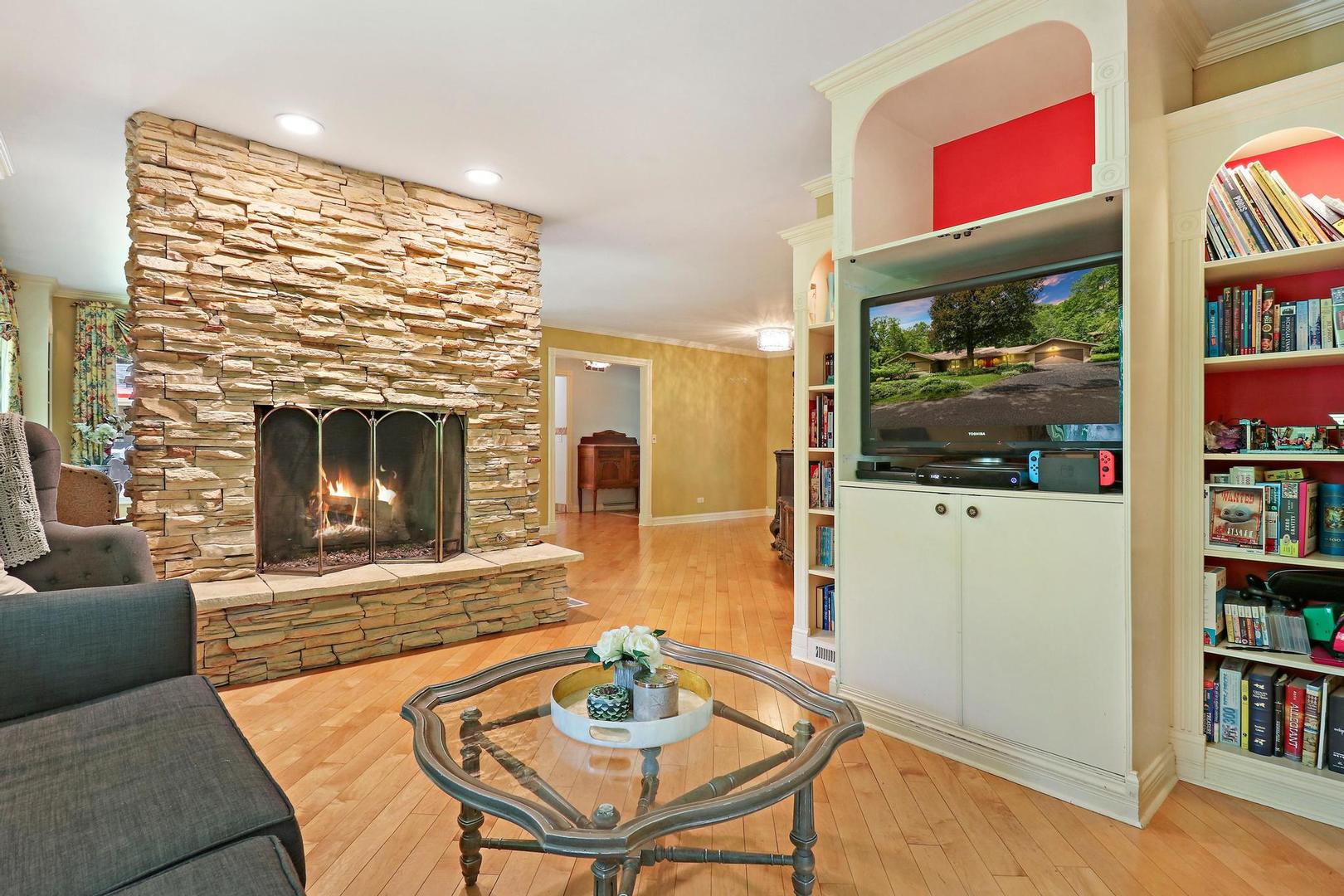 112 River Drive Trout Valley, IL 60013 - Photo 5 of 28 a living room with furniture and a fireplace