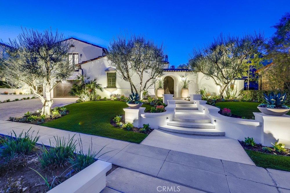 9 Broken Arrow Street Ladera Ranch, CA 92694 - Photo 1 of 1 a front view of a house with garden and a yard