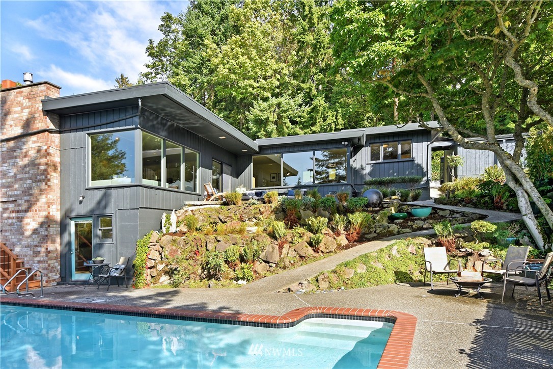 8425 Tillicum Road Southwest Seattle, WA 98136 - Photo 23 of 25 a front view of a house with garden