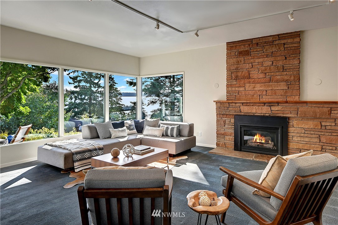 8425 Tillicum Road Southwest Seattle, WA 98136 - Photo 5 of 25 a living room with furniture and a fireplace