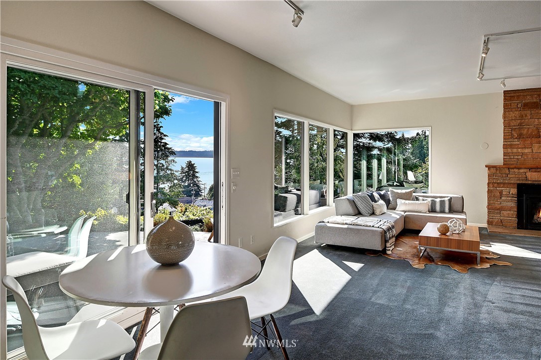 8425 Tillicum Road Southwest Seattle, WA 98136 - Photo 8 of 25 a living room with furniture and a large window