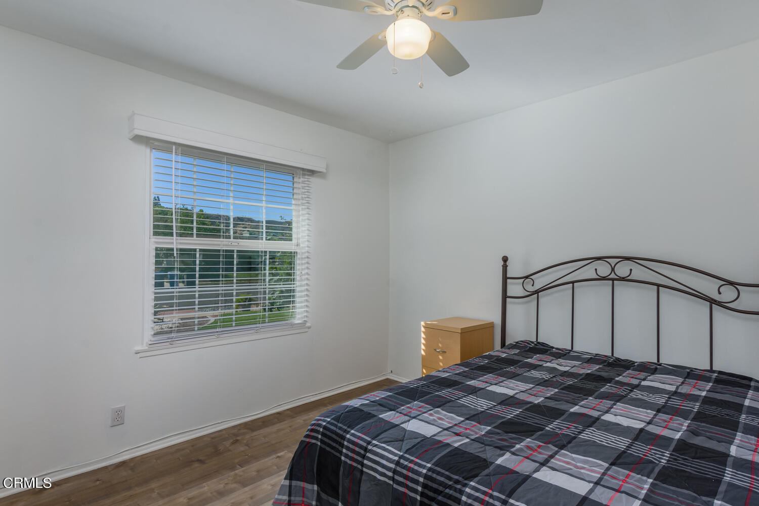 6283 Marsha Avenue Simi Valley, CA 93063 - Photo 14 of 21 a bedroom with a bed and a window