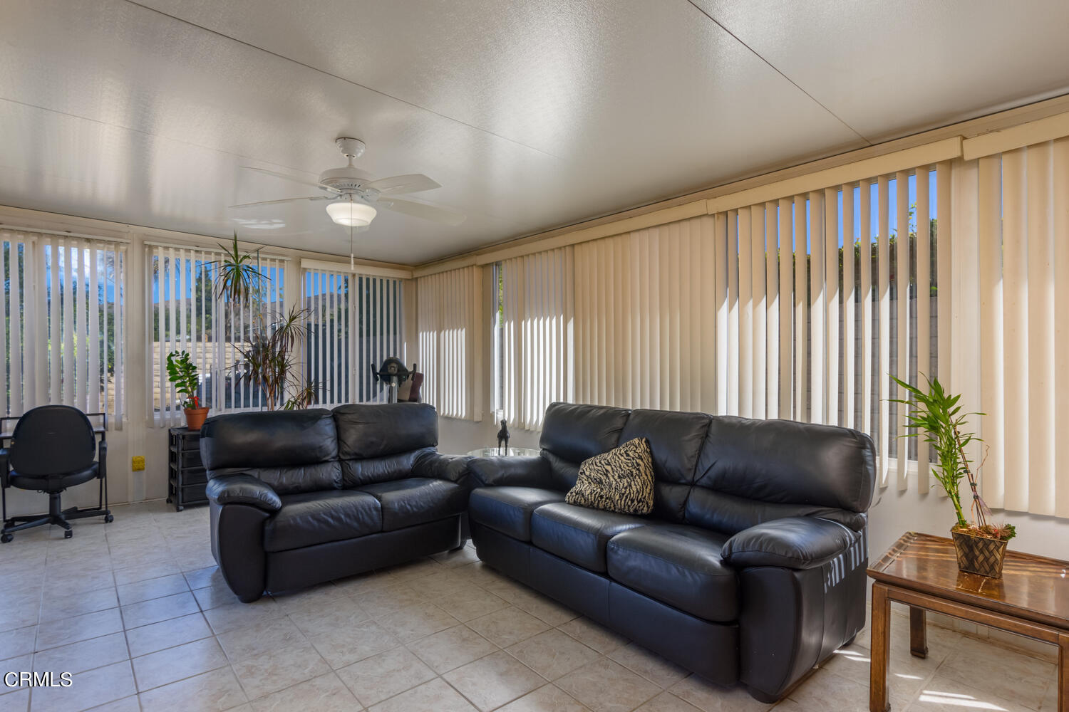 6283 Marsha Avenue Simi Valley, CA 93063 - Photo 15 of 21 a living room with furniture and a large window