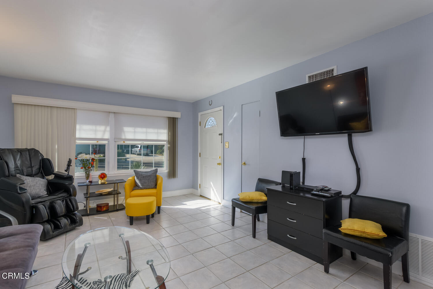 6283 Marsha Avenue Simi Valley, CA 93063 - Photo 5 of 21 a living room with furniture and a flat screen tv