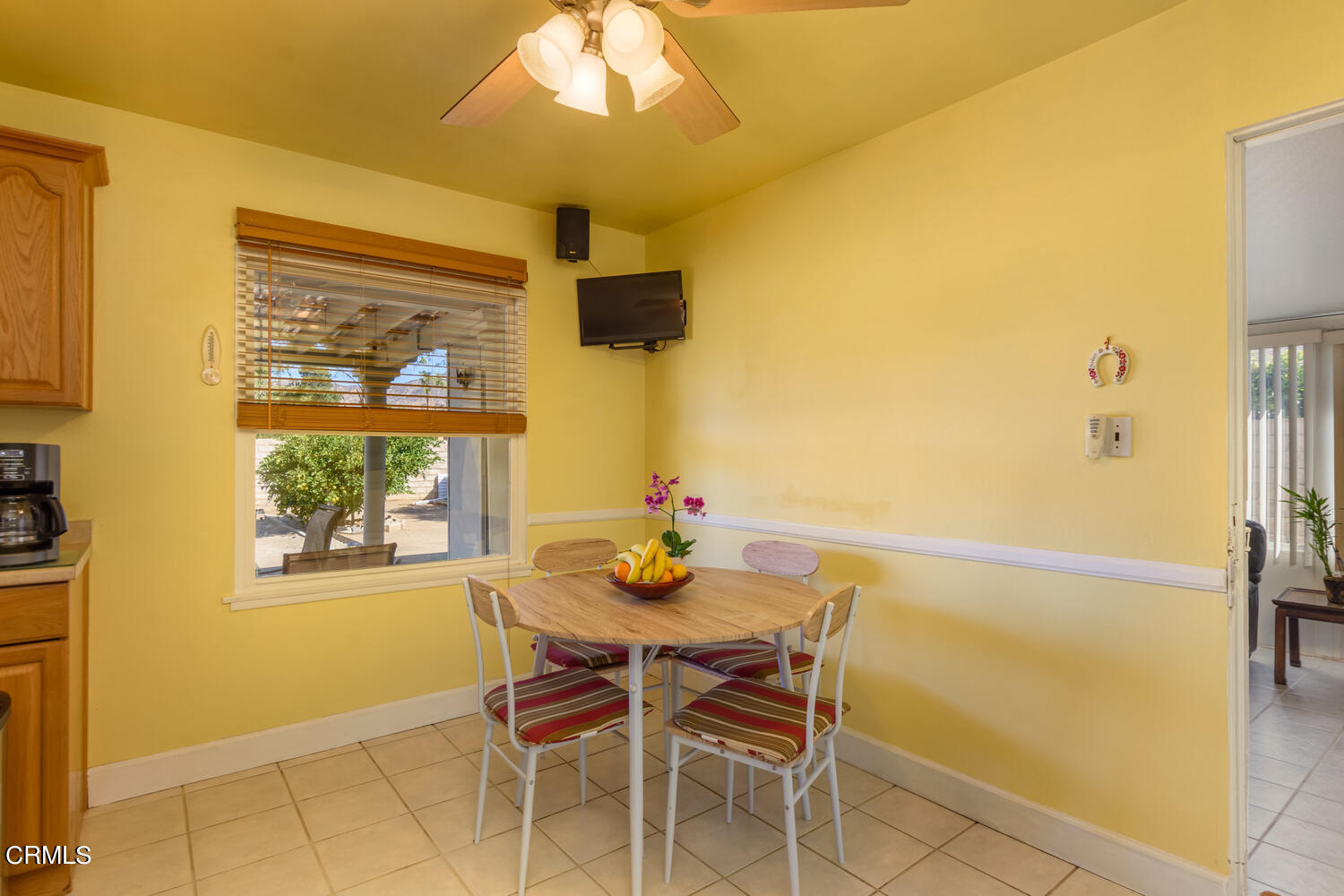 6283 Marsha Avenue Simi Valley, CA 93063 - Photo 8 of 21 a view of a dining room with furniture and a window