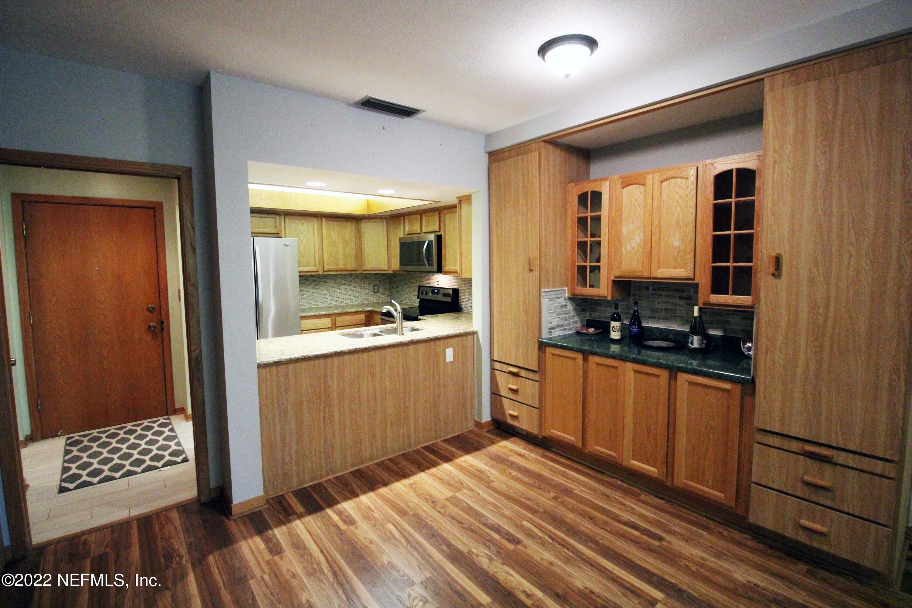 2910 Ravines Road, Unit 1107 Middleburg, FL 32068 - Photo 9 of 24 Dining w/built in