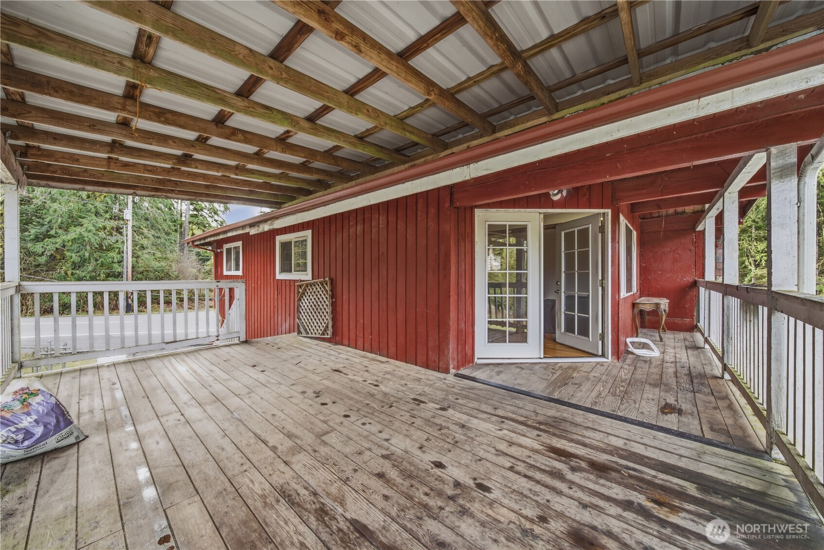 810 South Lake Roesiger Road Snohomish, WA 98290 - Photo 14 of 21 a view of porch with wooden floor
