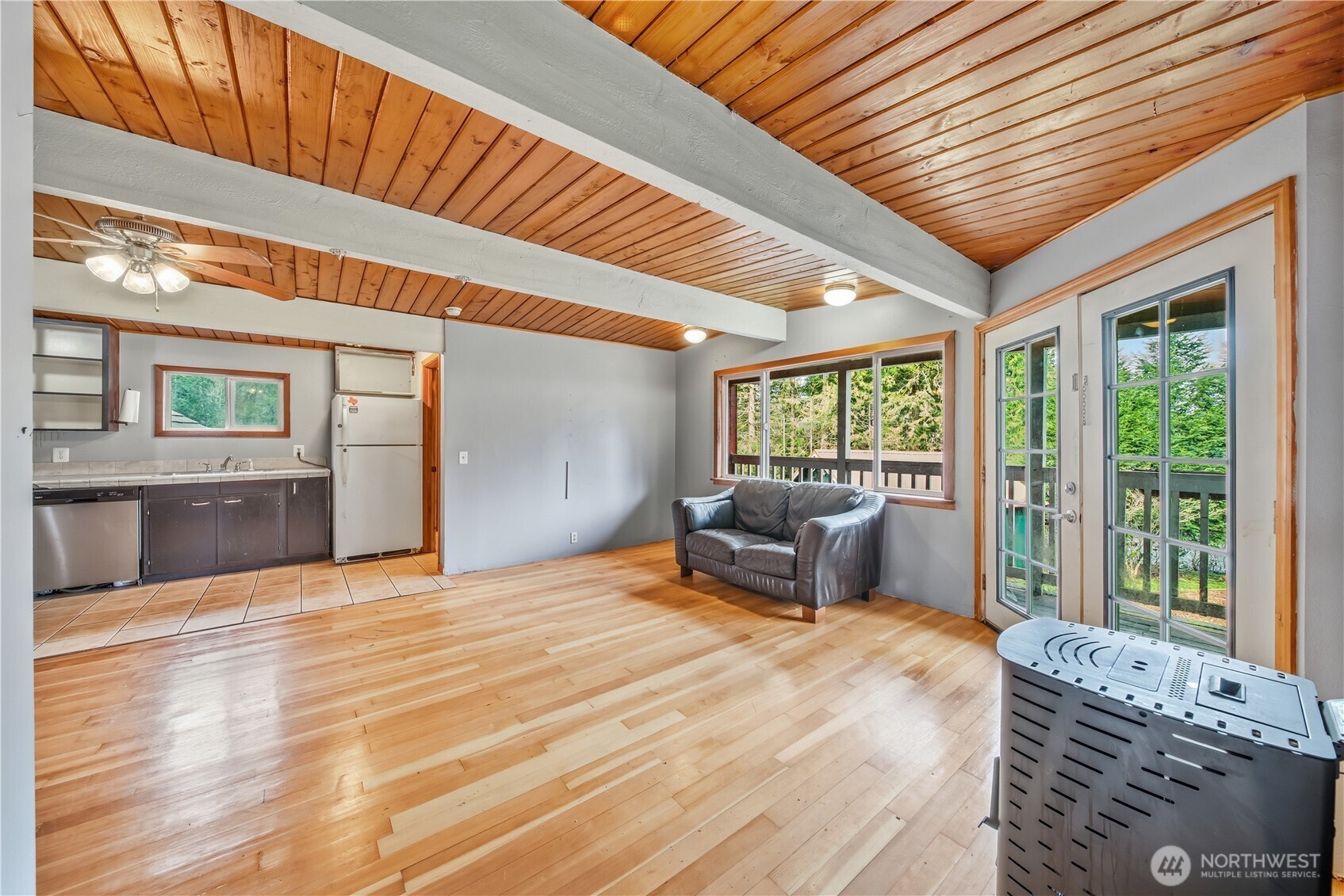 810 South Lake Roesiger Road Snohomish, WA 98290 - Photo 15 of 21 a spacious bedroom with a large bed and a large window