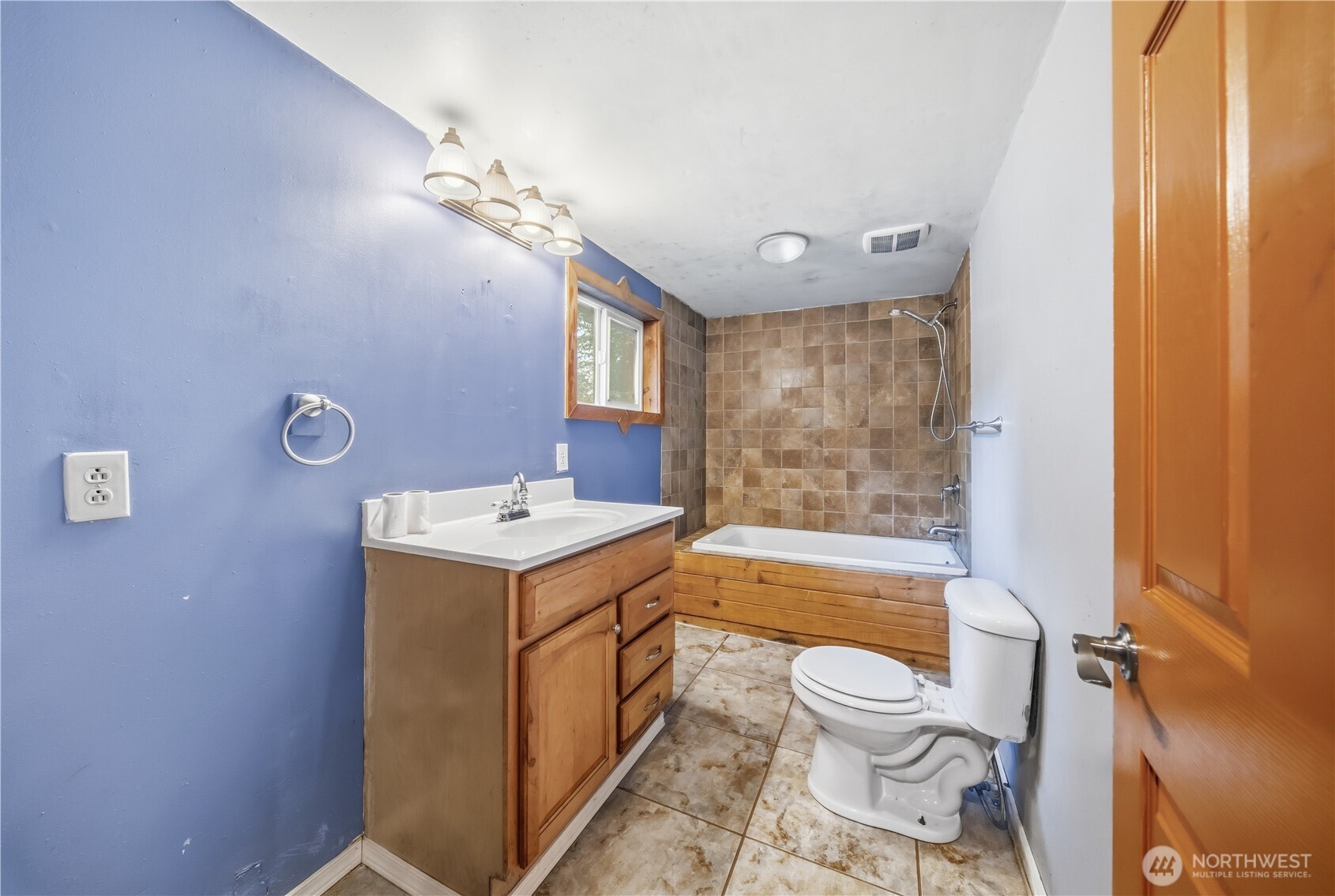 810 South Lake Roesiger Road Snohomish, WA 98290 - Photo 21 of 21 a bathroom with a sink toilet vanity granite tub and shower